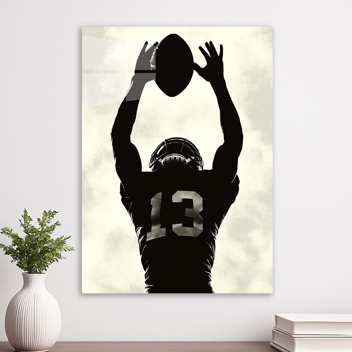 Football Player Catching the Ball