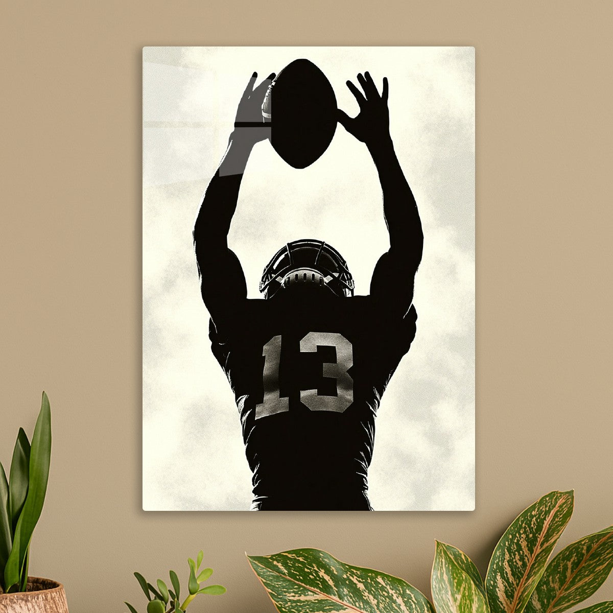 Football Player Catching the Ball
