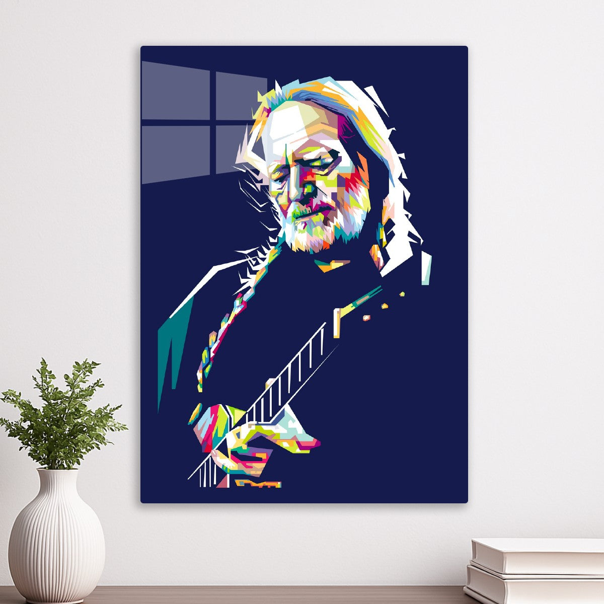 Willie Nelson playing guitar