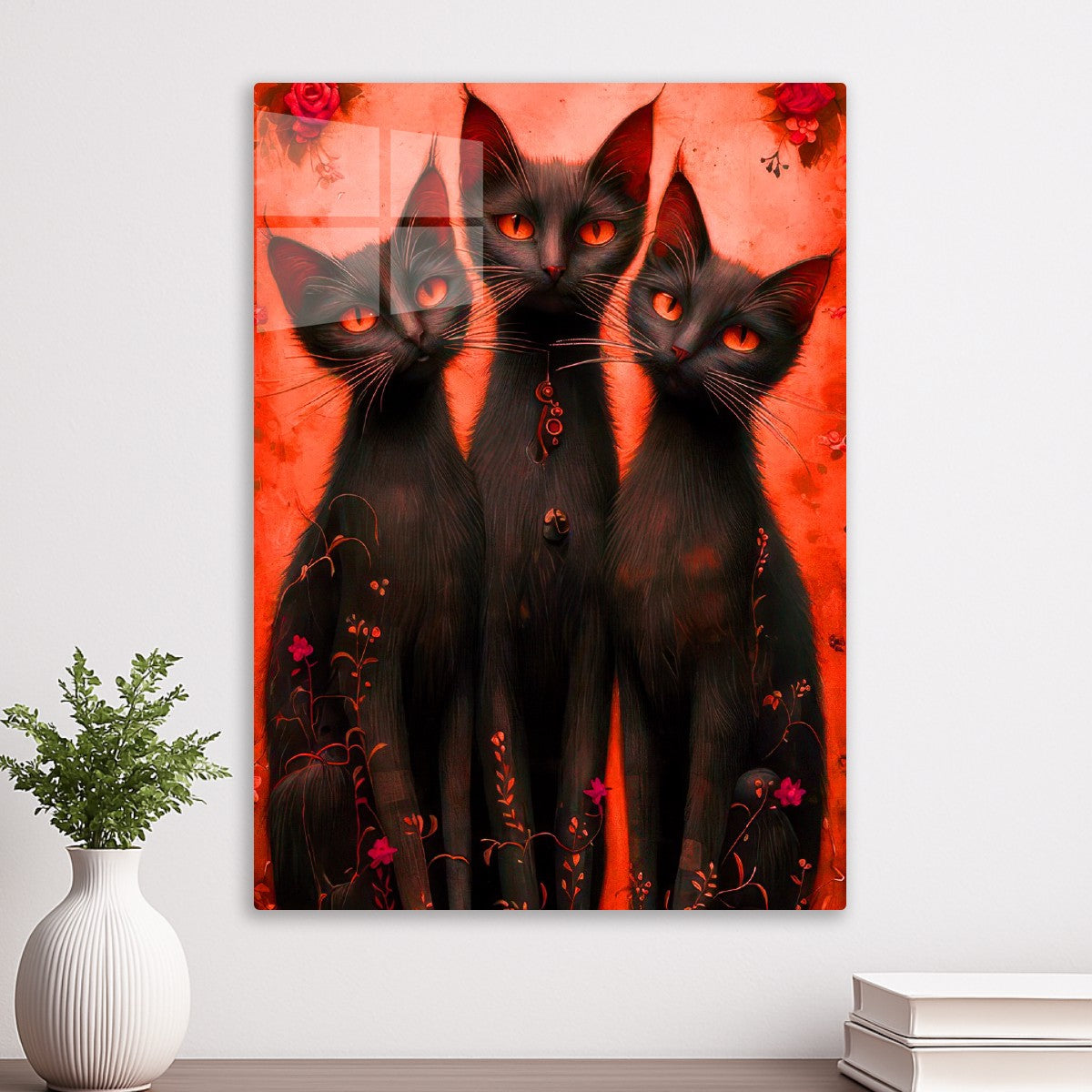 Three black cats