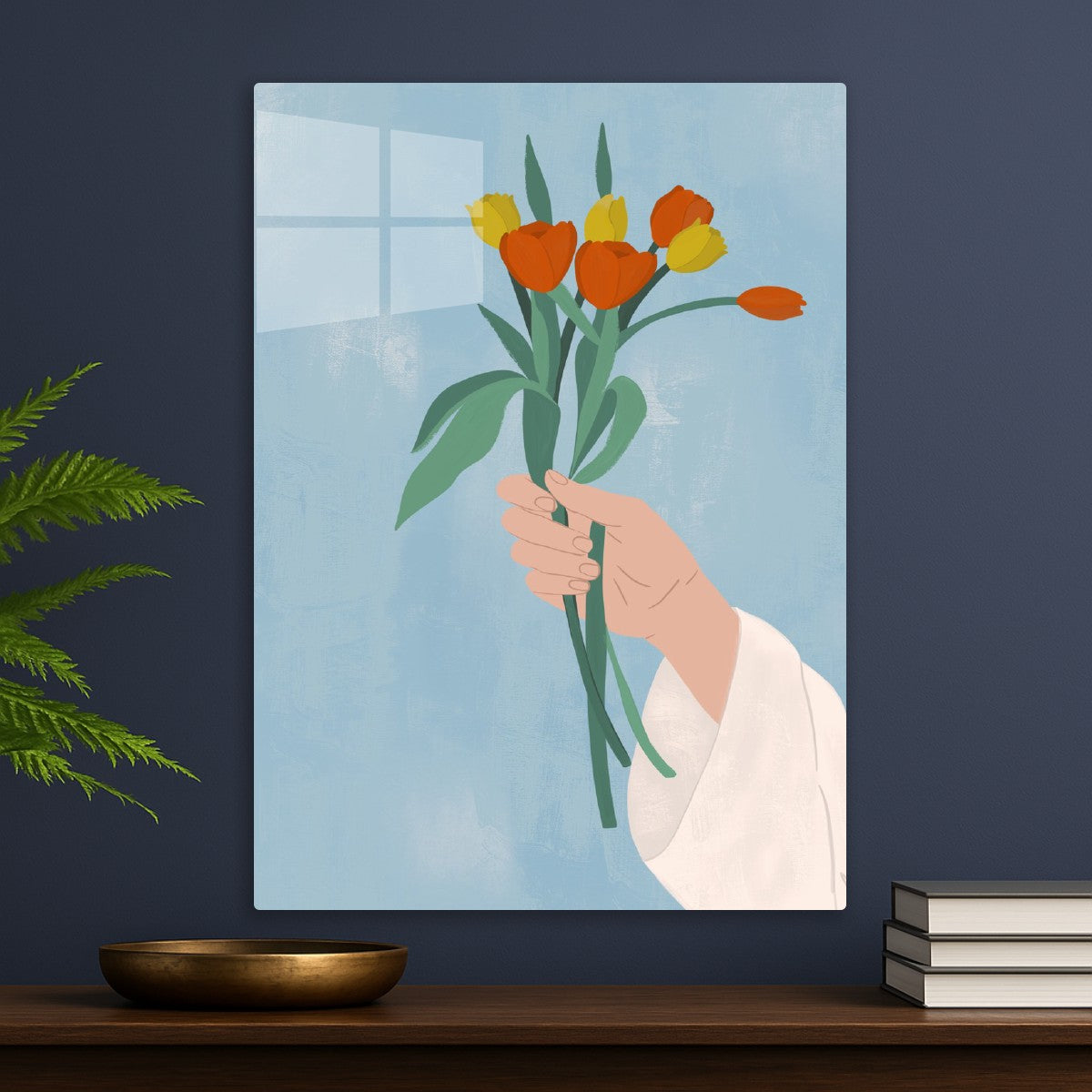 Hand holding tulips