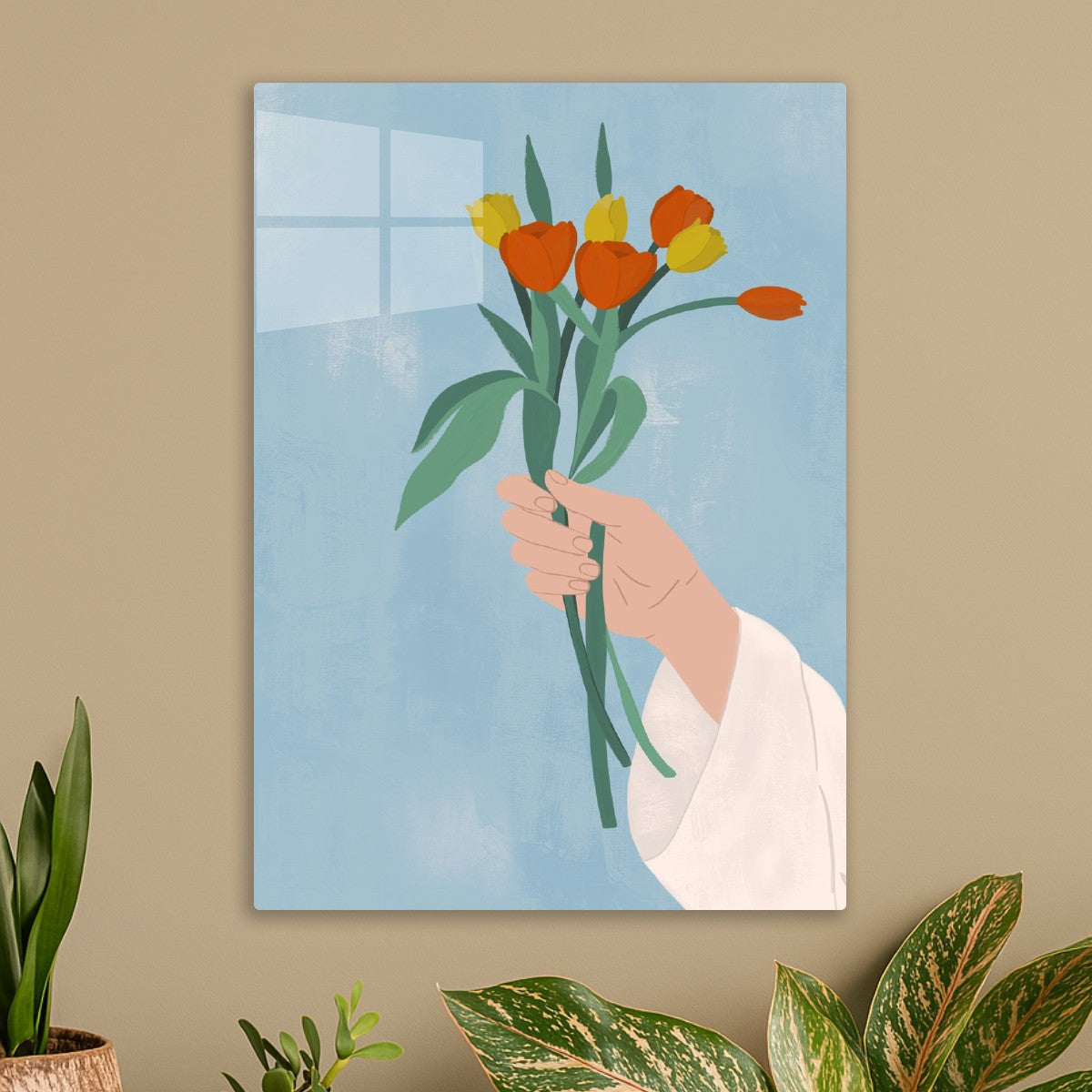 Hand holding tulips