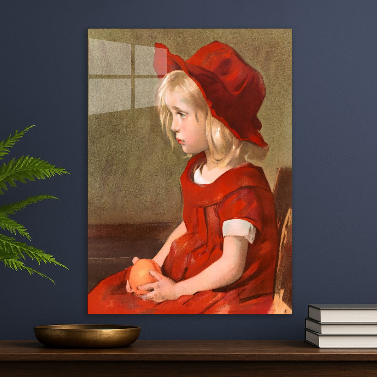 Girl with a red dress, holding an orange