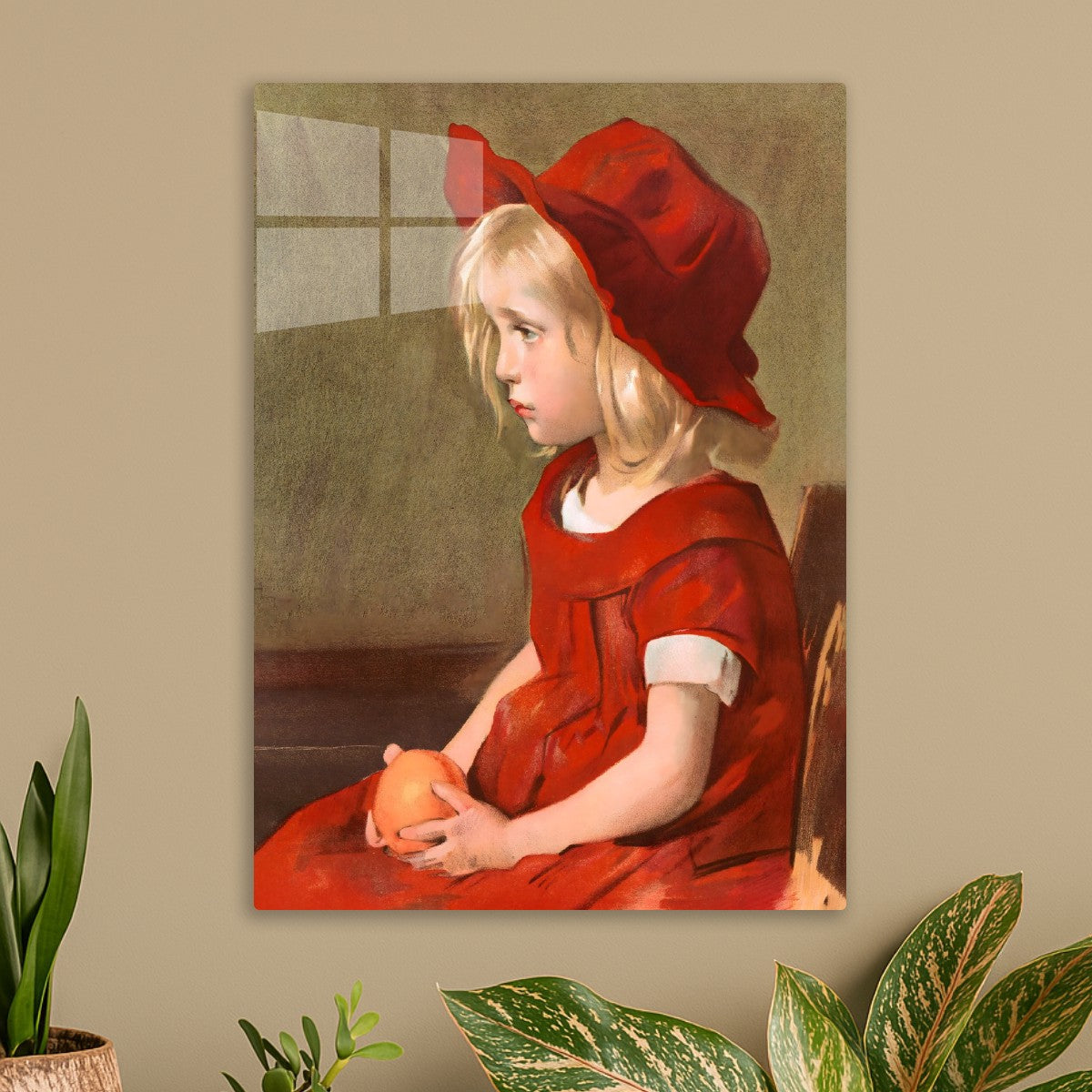 Girl with a red dress, holding an orange