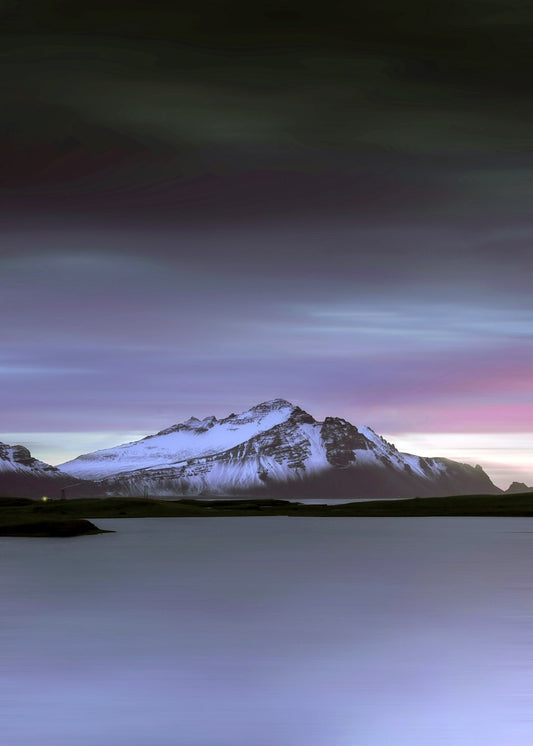 Snowy mountain with purple sky