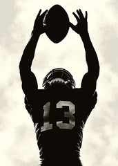 Football Player Catching the Ball